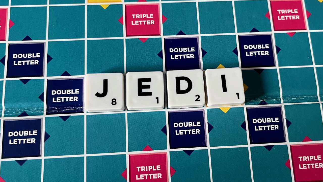The word “Jedi” played on a Scrabble board