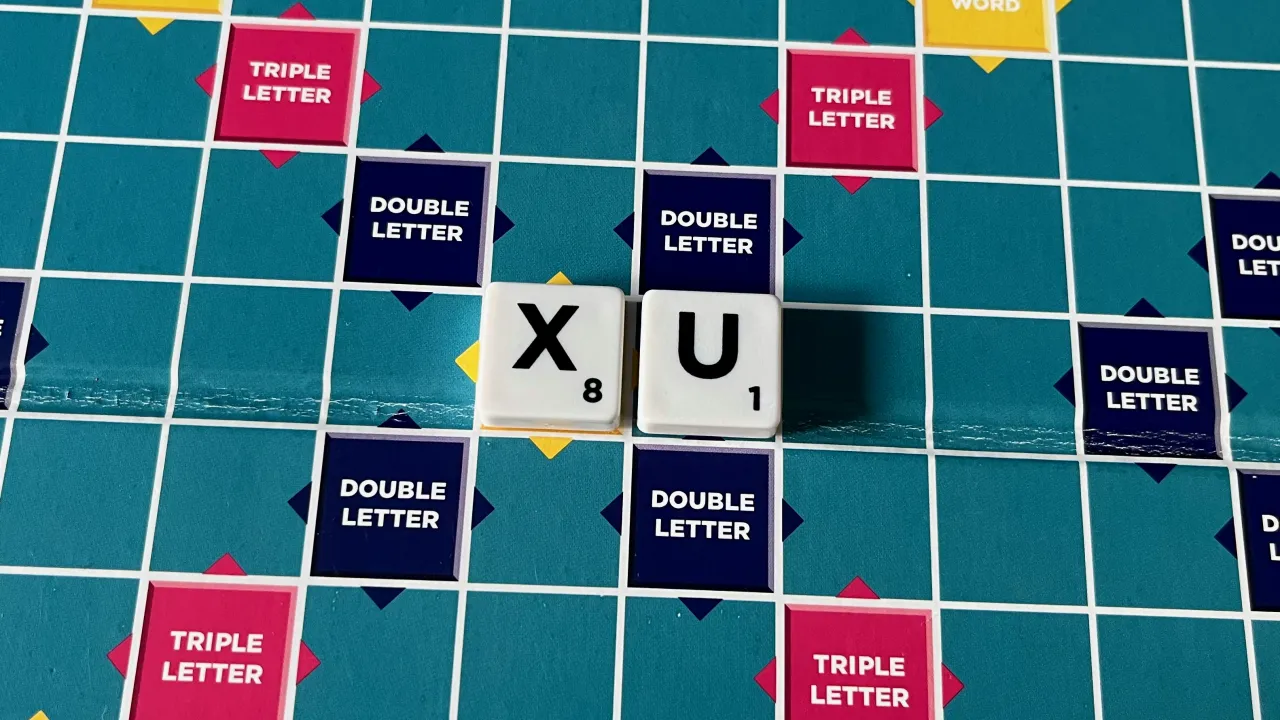 The word “Xu” played on a Scrabble board